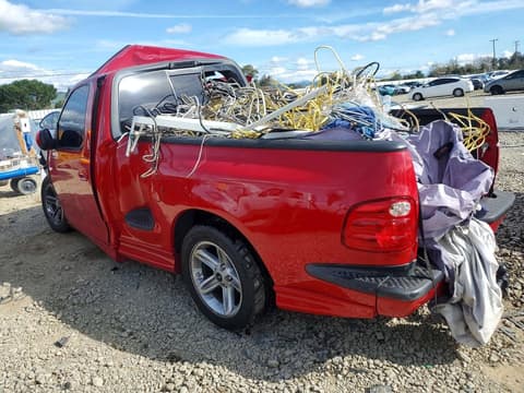 2004 Ford F-150 Lightning, VIN 2FTRF07304CA69548. Zdjęcie 2 z 6 z aukcji Copart. Katalog aut z USA OpenDataCar.