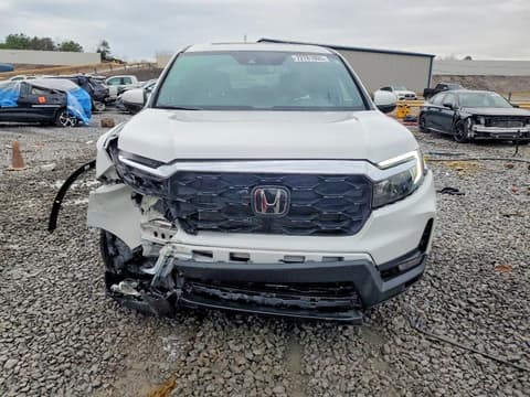 2023 Honda Passport, VIN 5FNYF8H53PB040343. Фото 5 з 6 з аукціону Copart. Каталог авто зі США OpenDataCar.