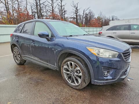 2016 Mazda CX-5, VIN JM3KE4DY5G0660845. Фото 4 з 6 з аукціону Copart. Каталог авто зі США OpenDataCar.