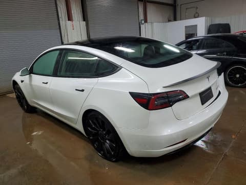 2023 Tesla Model 3, VIN 5YJ3E1ECXPF667791. Фото 2 з 6 з аукціону Copart. Каталог авто зі США OpenDataCar.