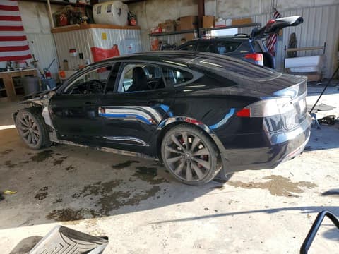 2015 Tesla Model S, VIN 5YJSA1E11FF116332. Photo 2 of 6 from Copart auction. OpenDataCar US salvage catalog.