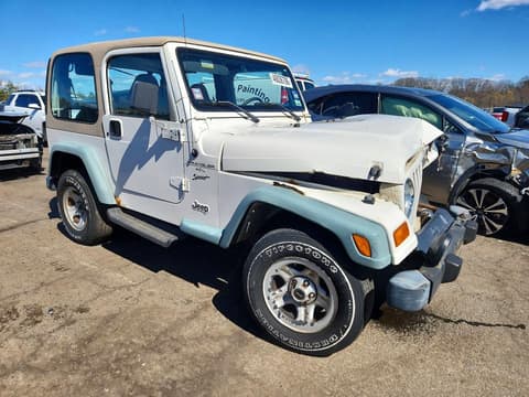 1999 Jeep Wrangler, VIN 1J4FY19S2XP435529. Фото 4 из 6 с аукциона Copart. Каталог авто из США OpenDataCar.