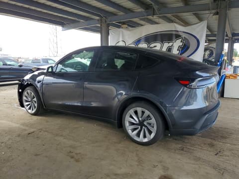 2026 Tesla Model Y, VIN 7SAYGDED4TF565409. Фото 2 з 6 з аукціону Copart. Каталог авто зі США OpenDataCar.