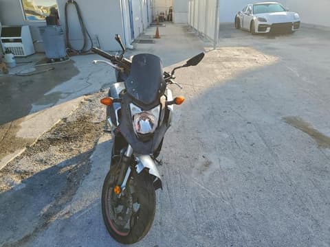 2012 Honda NC700, VIN JH2RC6354CK000401. Фото 2 з 6 з аукціону Copart. Каталог авто зі США OpenDataCar.