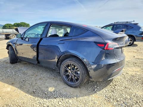 2025 Tesla Model Y, VIN 7SAYGDED8SF262924. Фото 2 з 6 з аукціону Copart. Каталог авто зі США OpenDataCar.