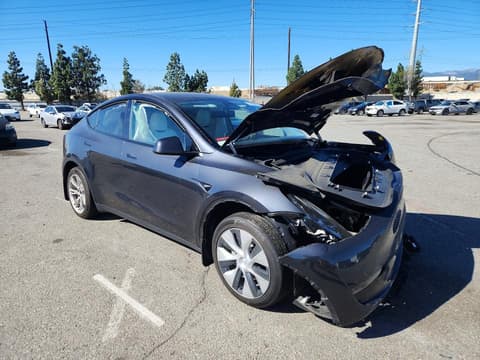 2024 Tesla Model Y, VIN 7SAYGDED9RF009508. Фото 4 з 6 з аукціону Copart. Каталог авто зі США OpenDataCar.