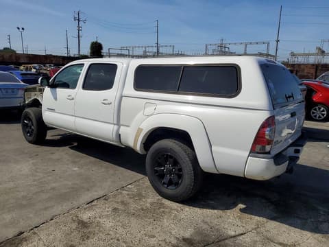 2014 Toyota Tacoma, VIN 5TFKU4HN4EX005477. Фото 2 из 6 с аукциона Copart. Каталог авто из США OpenDataCar.
