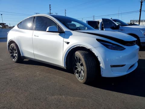 2023 Tesla Model Y, VIN 7SAYGAEE7PF787066. Фото 4 з 6 з аукціону Copart. Каталог авто зі США OpenDataCar.