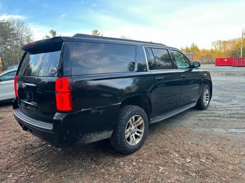 2015 Chevrolet Suburban, VIN 1GNSKHKCXFR162688. Photo 4 of 6 from Copart auction. OpenDataCar US salvage catalog.