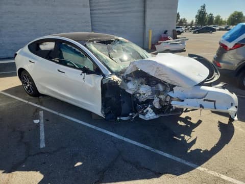 2022 Tesla Model 3, VIN 5YJ3E1EA9NF355506. Фото 4 з 6 з аукціону Copart. Каталог авто зі США OpenDataCar.