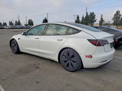 2022 Tesla Model 3, VIN 5YJ3E1EA3NF145323. Фото 2 з 6 з аукціону Copart. Каталог авто зі США OpenDataCar.