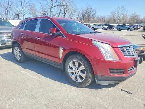 2014 Cadillac SRX, VIN 3GYFNBE31ES516629. Photo 4 of 6 from Copart auction. OpenDataCar US salvage catalog.
