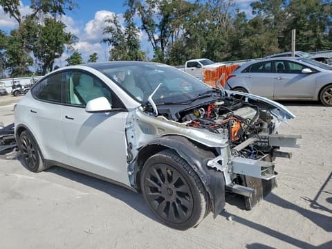 2023 Tesla Model Y, VIN 7SAYGAEE8PF697036. Фото 4 з 6 з аукціону Copart. Каталог авто зі США OpenDataCar.