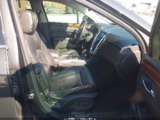 2016 Cadillac SRX, VIN 3GYFNBE36GS540802. Фото 5 з 6 з аукціону IAAI. Каталог авто зі США OpenDataCar.