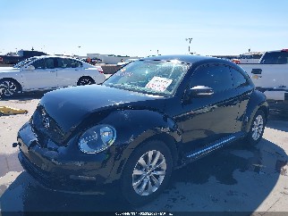 2014 Volkswagen Beetle, VIN 3VWF17AT1EM652104. Photo 2 of 6 from IAAI auction. OpenDataCar US salvage catalog.