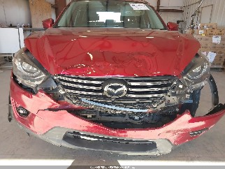 2016 Mazda CX-5, VIN JM3KE2DY6G0695592. Фото 6 з 6 з аукціону IAAI. Каталог авто зі США OpenDataCar.