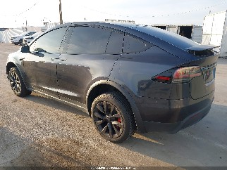 2023 Tesla Model X, VIN 7SAXCBE64PF422737. Фото 3 из 6 с аукциона IAAI. Каталог авто из США OpenDataCar.