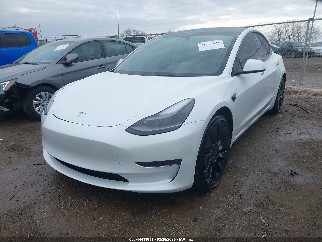2023 Tesla Model 3, VIN 5YJ3E1EC9PF601667. Фото 2 из 6 с аукциона IAAI. Каталог авто из США OpenDataCar.
