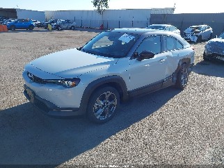 2023 Mazda MX-30 EV, VIN JM1DRADB0P0200623. Photo 2 of 6 from IAAI auction. OpenDataCar US salvage catalog.