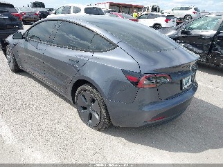 2023 Tesla Model 3, VIN 5YJ3E1EA0PF692021. Фото 3 з 6 з аукціону IAAI. Каталог авто зі США OpenDataCar.