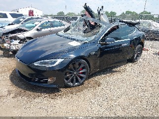 2016 Tesla Model S, VIN 5YJSA1E41GF143185. Фото 2 из 6 с аукциона IAAI. Каталог авто из США OpenDataCar.