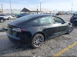 2022 Tesla Model 3, VIN 5YJ3E1EA7NF327297. Фото 4 з 6 з аукціону IAAI. Каталог авто зі США OpenDataCar.