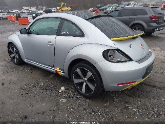 2013 Volkswagen Beetle, VIN 3VW467ATXDM611672. Фото 3 з 6 з аукціону IAAI. Каталог авто зі США OpenDataCar.