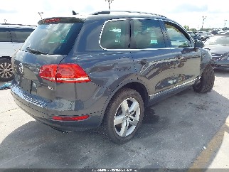 2011 Volkswagen Touareg, VIN WVGFF9BP6BD007209. Фото 4 из 6 с аукциона IAAI. Каталог авто из США OpenDataCar.
