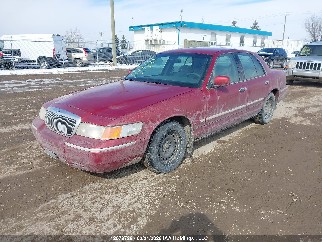 1999 Mercury Grand Marquis, VIN 2MEFM74W8XX697336. Zdjęcie 2 z 6 z aukcji IAAI. Katalog aut z USA OpenDataCar.