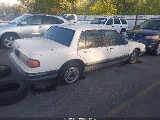 1990 Pontiac Bonneville, VIN 1G2HX54C0L1283132. Фото 4 из 6 с аукциона IAAI. Каталог авто из США OpenDataCar.