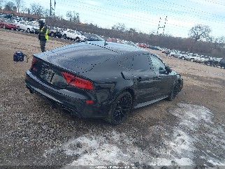 2014 Audi RS7, VIN WUAW2CFC5EN900929. Фото 4 из 6 с аукциона IAAI. Каталог авто из США OpenDataCar.