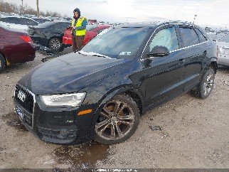 2015 Audi Q3, VIN WA1GFCFS9FR005932. Фото 2 з 6 з аукціону IAAI. Каталог авто зі США OpenDataCar.