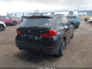 2015 Bmw X1, VIN WBAVM1C52FV497777. Фото 4 из 6 с аукциона IAAI. Каталог авто из США OpenDataCar.