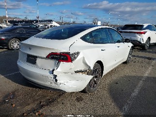 2023 Tesla Model 3, VIN 5YJ3E1EA9PF559662. Фото 4 з 6 з аукціону IAAI. Каталог авто зі США OpenDataCar.