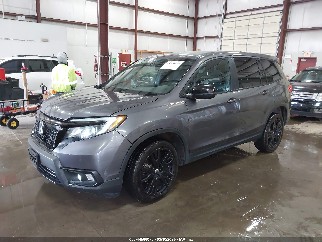 2021 Honda Passport, VIN 5FNYF8H22MB011255. Фото 2 з 6 з аукціону IAAI. Каталог авто зі США OpenDataCar.