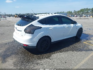 2012 Ford Focus, VIN 1FAHP3M24CL454157. Photo 4 of 6 from IAAI auction. OpenDataCar US salvage catalog.