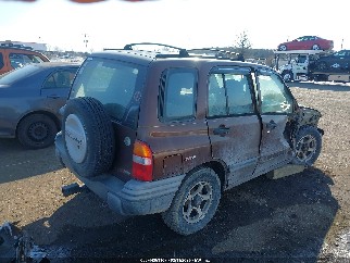 2000 Chevrolet Tracker, VIN 2CNBJ13C1Y6920638. Zdjęcie 4 z 6 z aukcji IAAI. Katalog aut z USA OpenDataCar.