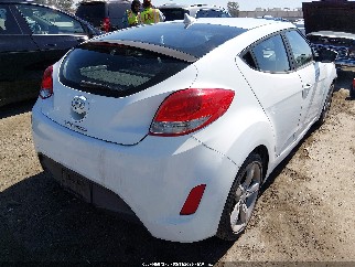 2013 Hyundai Veloster, VIN KMHTC6AD2DU133667. Фото 4 з 6 з аукціону IAAI. Каталог авто зі США OpenDataCar.