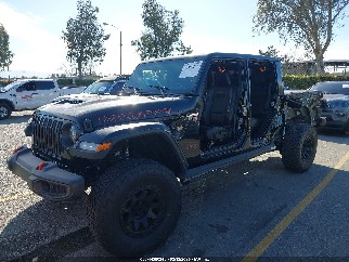 2022 Jeep Gladiator, VIN 1C6JJTEG3NL103693. Фото 2 из 6 с аукциона IAAI. Каталог авто из США OpenDataCar.
