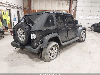 2023 Jeep Wrangler, VIN 1C4HJXDNXPW537772. Фото 4 из 6 с аукциона IAAI. Каталог авто из США OpenDataCar.