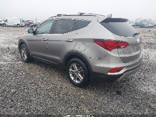 2018 Hyundai Santa Fe, VIN 5NMZUDLB0JH064623. Zdjęcie 3 z 6 z aukcji IAAI. Katalog aut z USA OpenDataCar.