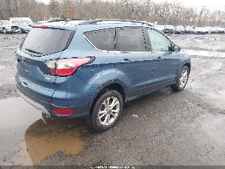 2018 Ford Escape, VIN 1FMCU9GD4JUC84138. Фото 4 з 6 з аукціону IAAI. Каталог авто зі США OpenDataCar.
