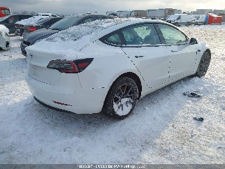 2021 Tesla Model 3, VIN 5YJ3E1EAXMF861876. Фото 4 из 6 с аукциона IAAI. Каталог авто из США OpenDataCar.