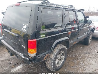 2000 Jeep Cherokee, VIN 1J4FF48S9YL181965. Photo 4 of 6 from IAAI auction. OpenDataCar US salvage catalog.