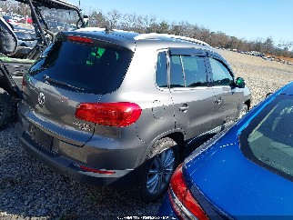 2014 Volkswagen Tiguan, VIN WVGBV3AX8EW563806. Фото 4 з 6 з аукціону IAAI. Каталог авто зі США OpenDataCar.
