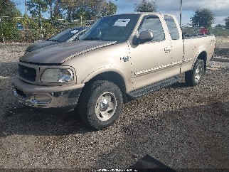 1998 Ford F-150, VIN 1FTRX18L3WNC33728. Фото 2 з 6 з аукціону IAAI. Каталог авто зі США OpenDataCar.