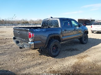 2021 Toyota Tacoma, VIN 5TFCZ5AN2MX254588. Photo 4 of 6 from IAAI auction. OpenDataCar US salvage catalog.