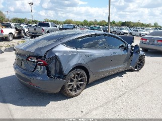 2023 Tesla Model 3, VIN 5YJ3E1EA1PF418455. Фото 4 з 6 з аукціону IAAI. Каталог авто зі США OpenDataCar.