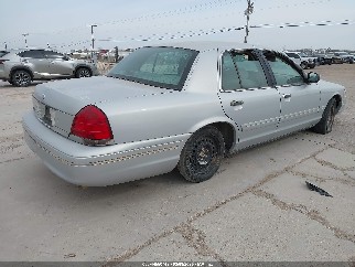 1998 Ford Crown Victoria, VIN 2FAFP73W0WX112103. Фото 4 з 6 з аукціону IAAI. Каталог авто зі США OpenDataCar.