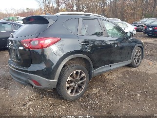 2016 Mazda CX-5, VIN JM3KE4DY4G0666765. Фото 4 з 6 з аукціону IAAI. Каталог авто зі США OpenDataCar.
